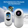 A promotional image showing two white sport cameras against a snowy mountain backdrop with a skier in mid-air. Produktbild-Vorschau