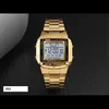 A gold digital watch is displayed on a dark, textured surface. Produktbild-Vorschau