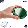A hand holding a green metal lid for a jar, with measurement diagrams and text overlays. Podgląd zdjęcia produktu