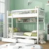 A white bunk bed with drawers and shelves in a child's bedroom with light green walls. Náhľad obrázku produktu