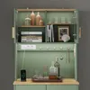 SoBuy Esszimmer Sideboard FSB108-E-GR mit geöffneten Türen und Dekoartikeln Voir les images du produit