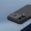 Close-up of a black phone case with a textured back and a sliding camera cover. Náhľad obrázku produktu