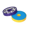 Two round vacuum cleaner filters, one purple with a white grid pattern and black text, and another blue and yellow. Produktbild-Vorschau