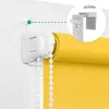Close-up of a yellow roller blind being installed using a clamp-on mounting system. Produktbild-Vorschau