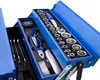 A blue metal toolbox filled with various tools, including sockets, a ratchet, and pliers. Produktbild-Vorschau
