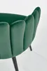 A close-up view of a green velvet chair with black legs, set against a white background. Náhled obrázku produktu