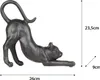 A black cat sculpture in a stretching pose, with dimensions indicated by measurement lines and text. Anteprima dell’immagine prodotto