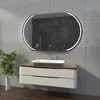 A modern bathroom vanity with a sink and a large oval LED mirror above it. Produktbild-Vorschau
