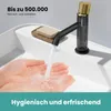 A close-up shot of a modern black faucet with a gold accent, dispensing water into a person's hands in a white sink. There is a bar of soap on a wooden dish next to the faucet. Podgląd zdjęcia produktu