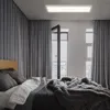 A bedroom scene with a bed, curtains, and a ceiling light. Produktbild-Vorschau