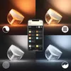 A collage showing a Philips Hue Iris table lamp in different lighting conditions and with a smartphone app interface. Produktbild-Vorschau