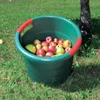 A green tub filled with apples sits on a grassy lawn next to a tree. Voir les images du produit