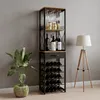 A wine rack with bottles and glasses is shown in a room with a plant and a lamp. Podgląd zdjęcia produktu