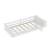 A white wooden bed frame with a slatted base and a partial railing, shown from a diagonal angle against a white background. Produktbild-Vorschau