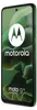 A green Motorola smartphone is shown against a green, abstract background. Náhľad obrázku produktu