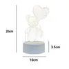A 3D LED lamp shaped like a teddy bear holding a heart-shaped balloon, with dimensions indicated. Produktbild-Vorschau