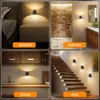 Collage of four scenes showing LED night lights in different home settings: bedroom, bathroom, kitchen, and aisle. Produktbild-Vorschau