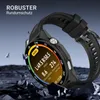 A smartwatch with a black strap is shown in a dynamic, debris-filled environment, suggesting durability. Produktbild-Vorschau