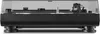 A close-up, front-facing view of a black turntable with a clear dust cover. Produktbild-Vorschau