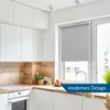 A modern kitchen with white cabinets, a wooden backsplash, and a window with a gray roller blind. Produktbild-Vorschau
