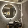A modern bathroom vanity with a sink, mirror, and lighting. Produktbild-Vorschau