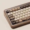 A close-up view of a wooden mechanical keyboard with decorative keycaps. Produktbild-Vorschau