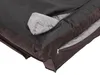 A close-up view of a dog bed with a zipper partially open, revealing the inner padding. Podgląd zdjęcia produktu