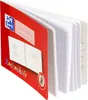 An open notebook with a red cover, showing grid-lined pages. Voir les images du produit
