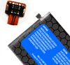 Close-up of a battery with warning labels and a detail of its connector. Produktbild-Vorschau