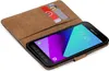 A book-style phone case with two cards inserted, showing a Samsung phone inside. Anteprima dell’immagine prodotto