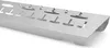 A close-up, angled view of a silver metal grill accessory with cut-out T-shaped slots. Podgląd zdjęcia produktu
