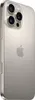 A close-up, angled view of the back of an iPhone 16 Pro in Titanium Natural. Podgląd zdjęcia produktu