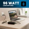 A laptop is charging on a desk, connected to a power adapter plugged into a wall outlet. Podgląd zdjęcia produktu