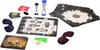 A collection of board game components laid out on a white surface. Produktbild-Vorschau