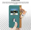 A hand holding a teal wallet with credit cards and cash inserted, with a text overlay describing its function. Voir les images du produit