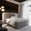 A modern bedroom with a large bed, decorative wall paneling, and ambient lighting. Produktbild-Vorschau