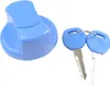 A blue fuel cap and two silver keys on a white background. Podgląd zdjęcia produktu