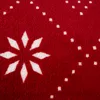 A close-up view of a red fabric with a white snowflake pattern. Produktbild-Vorschau