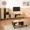 A modern living room setup featuring a TV stand, a coffee table, and a tall cabinet, all in a wood and black finish. Produktbild-Vorschau