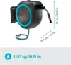 A wall-mounted hose reel with dimensions and weight indicated. Voir les images du produit