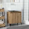 A bathroom vanity with a sink and cabinet. Anteprima dell’immagine prodotto