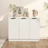 A white sideboard with three doors is shown against a light-colored wall. The top of the sideboard is decorated with a vase of plants, two small cups, and a pitcher. The floor is made of wooden planks. Anteprima dell’immagine prodotto