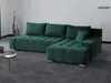 A green sectional sofa with tufted cushions is shown in a room with a gray carpet and a white wall. Produktbild-Vorschau