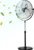 A black industrial stand fan is shown with green leaves and mist blowing from it, suggesting cooling and air circulation. Podgląd zdjęcia produktu