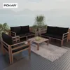 Outdoor lounge set on a deck overlooking a body of water and mountains. Produktbild-Vorschau