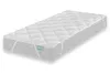A white quilted mattress topper is shown on top of a lighter gray mattress. The topper has elastic straps at each corner to secure it to the mattress. A small blue tag is visible on the side of the topper. Anteprima dell’immagine prodotto