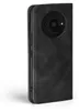A black flip-style phone case for a Xiaomi Redmi A3 is shown from the side. Produktbild-Vorschau