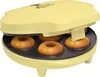A yellow donut maker with donuts inside. Podgląd zdjęcia produktu
