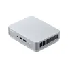 A silver ASUS mini PC is shown from a slightly elevated angle against a white background. Podgląd zdjęcia produktu