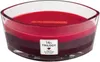 A three-layered scented candle in a glass container. Produktbild-Vorschau